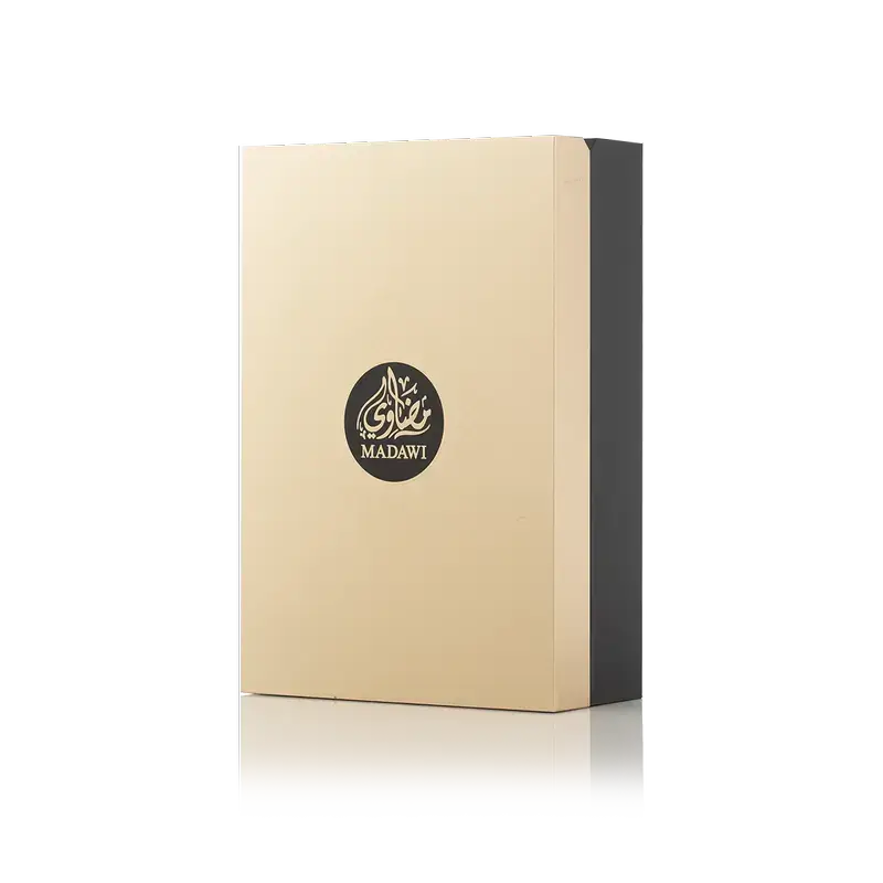 MADAWI GOLD EDITION packaging, luxurious gold box with black branding for Arabian Oud Eau de Parfum.