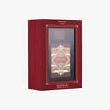 BADE'E AL OUD - SUBLIME 100ML by LATTAFA PERFUMES in an elegant red package with gold accents.