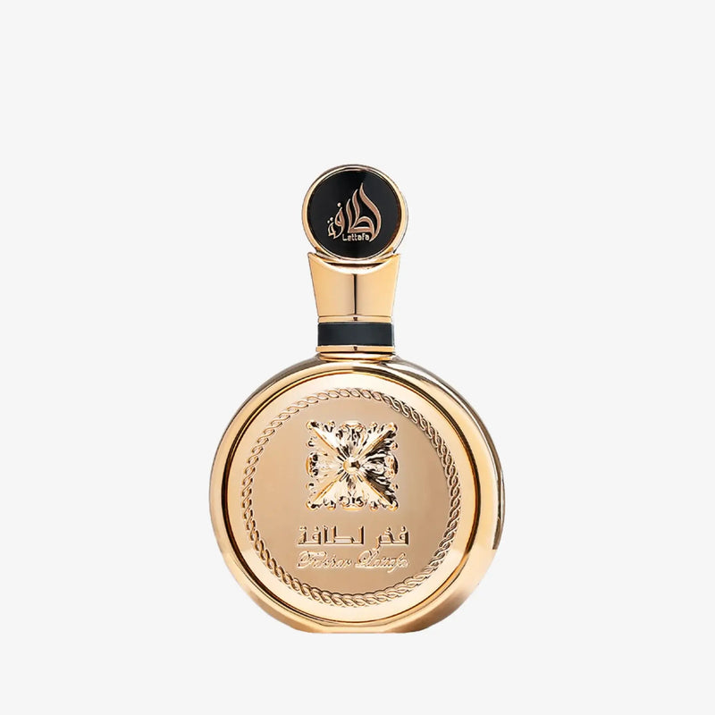 FAKHAR EXTRAIT EDP 100ml by LATTAFA in an elegant gold bottle, showcasing a luxurious fragrance design.