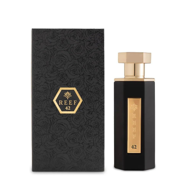REEF 42 Perfume 100ml in elegant black packaging with gold accents, featuring luxurious rose musk fragrance.