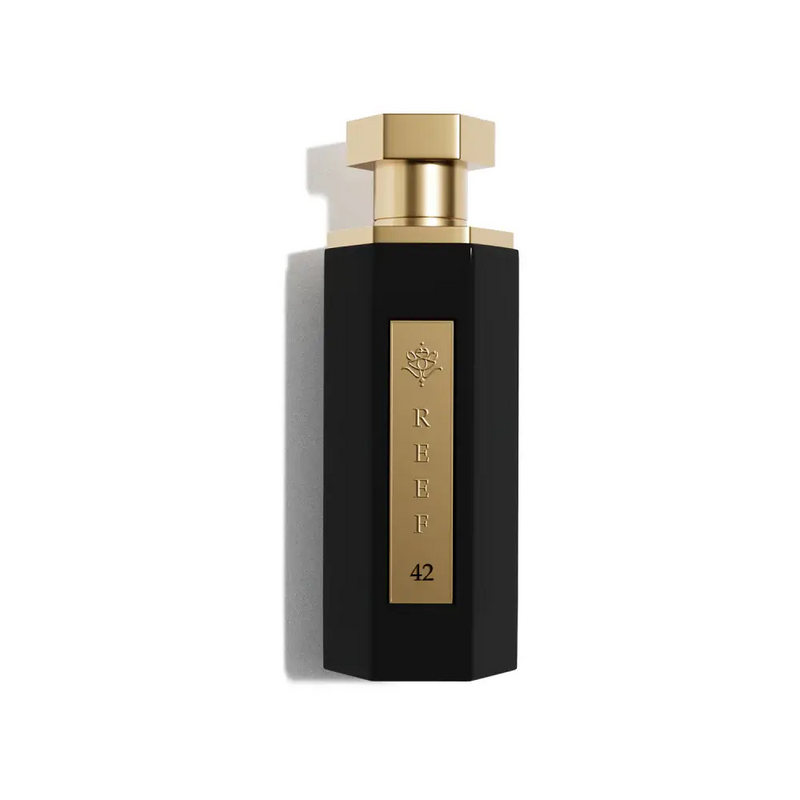 REEF 42 perfume bottle, luxurious rose musk Eau de Parfum in elegant black and gold packaging, 100ml.