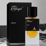 RIFAAQAT ADORN EAU DE PARFUM BY PARIS CORNER - 85ml bottle with packaging in a sleek black design, displaying elegance and sophistication.