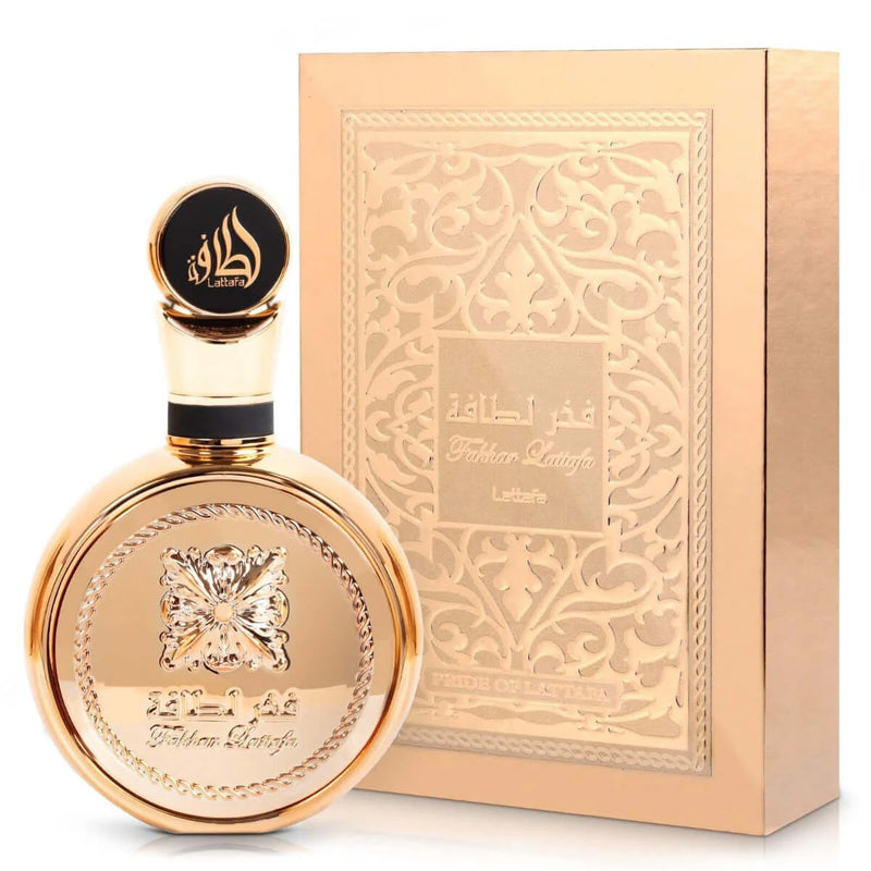 FAKHAR EXTRAIT EDP 100ml by LATTAFA bottle and packaging, showcasing its elegant design and luxurious appeal.